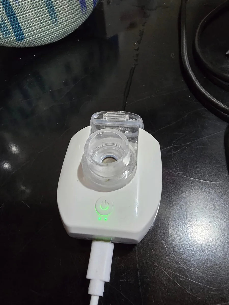 Portable nebulizer charging by USB cable